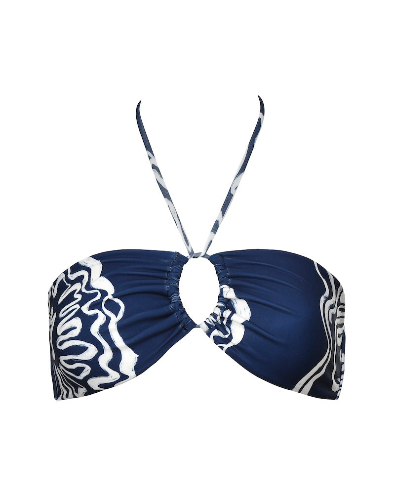 Navy blue and white patterned halter bikini top on a white background.