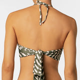 Green and white patterned bikini top on a plain background.