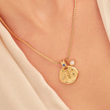 A 24k gold-plated necklace for Gemini  zodiac pendant, accompanied by a natural stone charm.