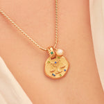 A 24k gold-plated necklace for Libra  zodiac pendant, accompanied by a natural stone charm.