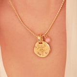 A 24k gold-plated necklace for Sagittarius  zodiac pendant, accompanied by a natural stone charm.