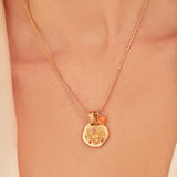 A 24k gold-plated necklace for Tauro  zodiac pendant, accompanied by a natural stone charm.