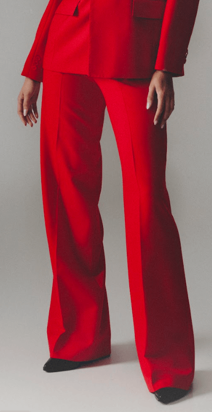 Model wearing red wool pants