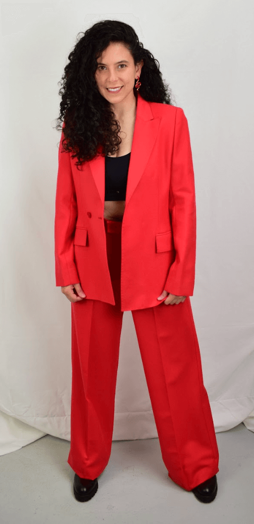 Model wearing red wool pants