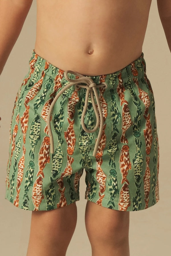 Boys green and orange fish patterned swim shorts.