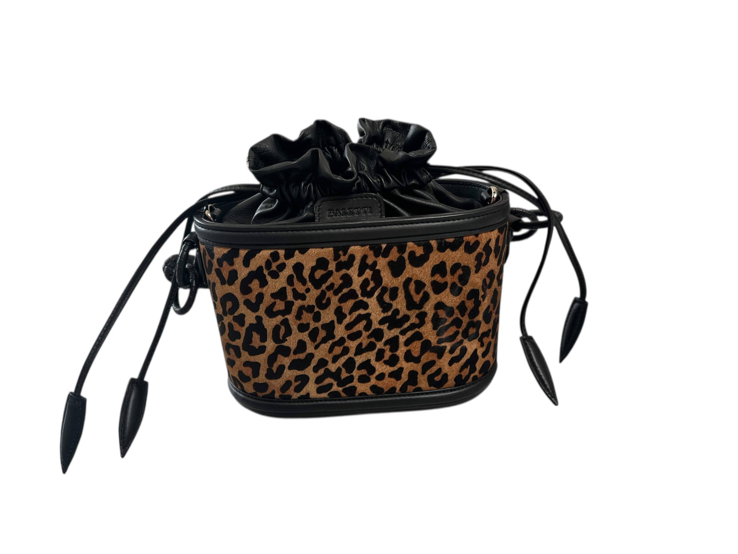 Leopard print drawstring bag with black accents on a white background.