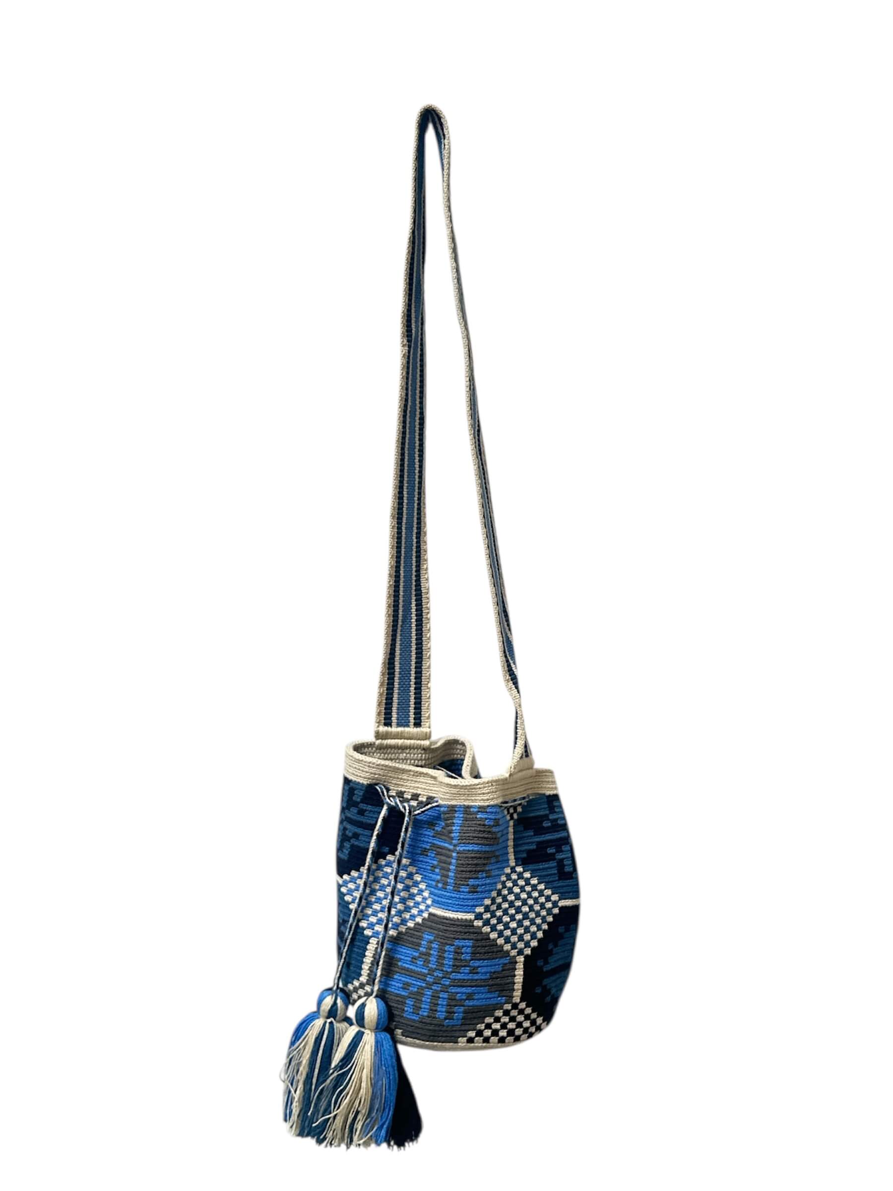 Handbag with blue and white pattern on a white background.