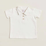 A white soft cotton polo shirt with a faux pocket, standing against a white background.