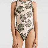 A model wearing a beige one-piece swimsuit with a nature-inspired shell print, featuring a high neckline and an open back with a tie closure.