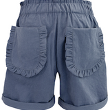 Girls blue shorts with ruffled pockets on a white background.