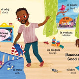 A page from 'Mis primeras palabras - Baby's First Words' featuring a father and his child and all the things in the babies room labeled in Spanish and English.