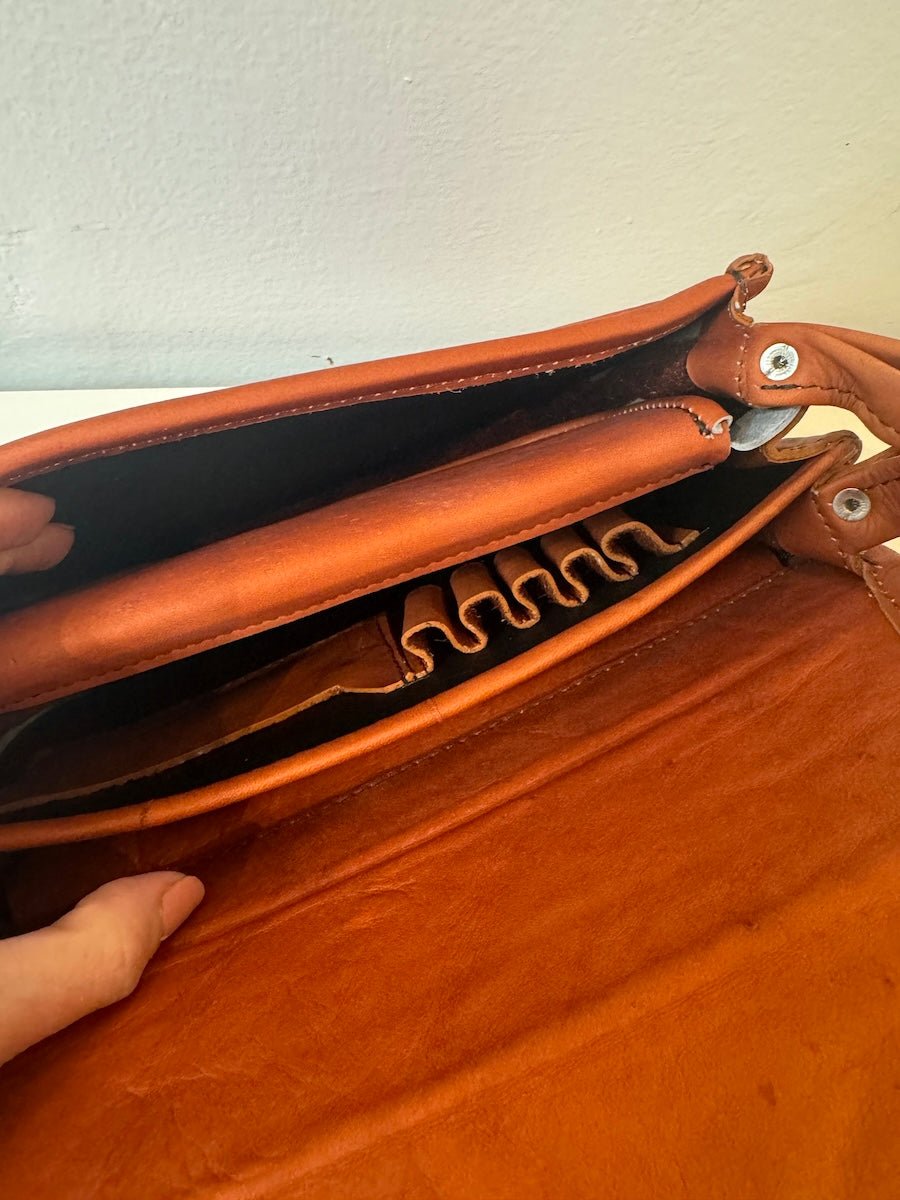 Close-up look of the inside of our Western Style leather crossbody bags. This one is Camel. It shows the pockets and details of this bag.
