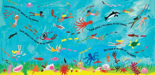 A page from the children's book 'El Mundo' featuring a colorful illustration of children in a vibrant ocean swimming alongside many different kinds of sea life.