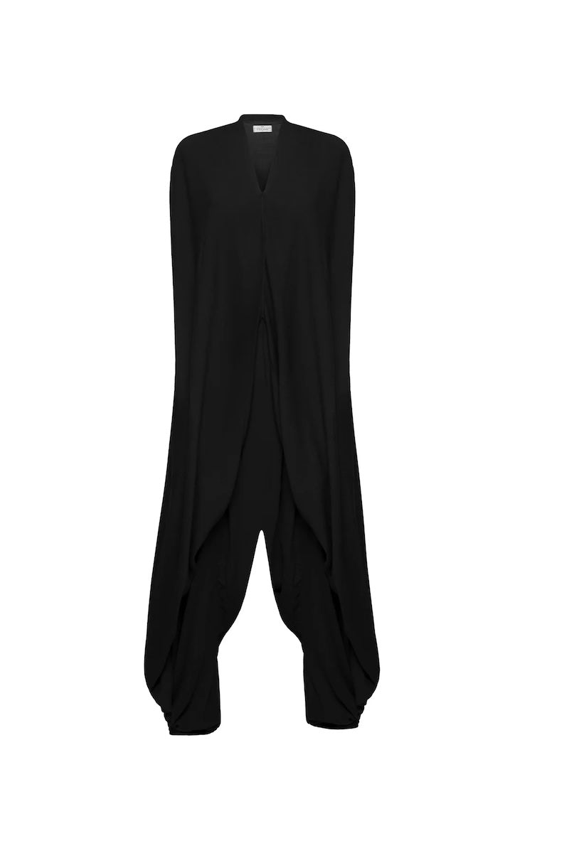 Image of a jumpsuit against a white background. The purpose of this image is to highlight the jumpsuit from NAOS, which is for sale at EVAMAIA boutique in Studio City, CA.
