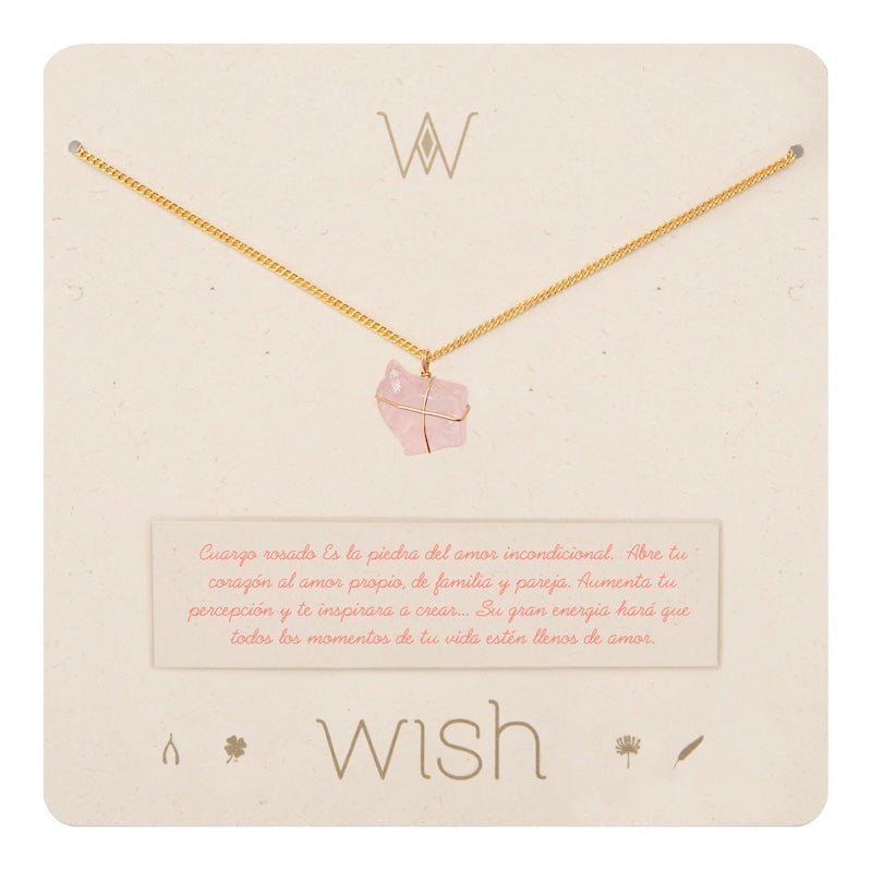 Image of a gold necklace with a rose quartz charm. It's on its packaging. The purpose of this image is to highlight the necklace by Wish Jewelry because it's sold at EVAMAIA boutique in Studio City, CA.