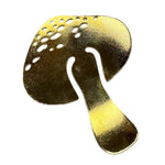 Close up image of a mushroom-shaped bookmark in gold. The purpose of this image is to highlight the bookmark, which is handmade by PAJAROLIMON.