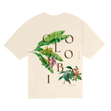A beige Colombia t-shirt with banana plant leaves and coffee plant drawings.