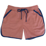 Pink shorts with blue trim on a white background.
