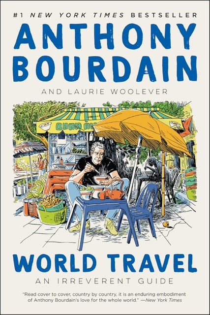 The cover of "World Travel: An Irreverent Guide" by Anthony Bourdain and Laurie Woolever. The cover depicts a vibrant illustration of Anthony Bourdain sitting at an outdoor cafe, surrounded by a colorful setting that includes various foods and beverages.