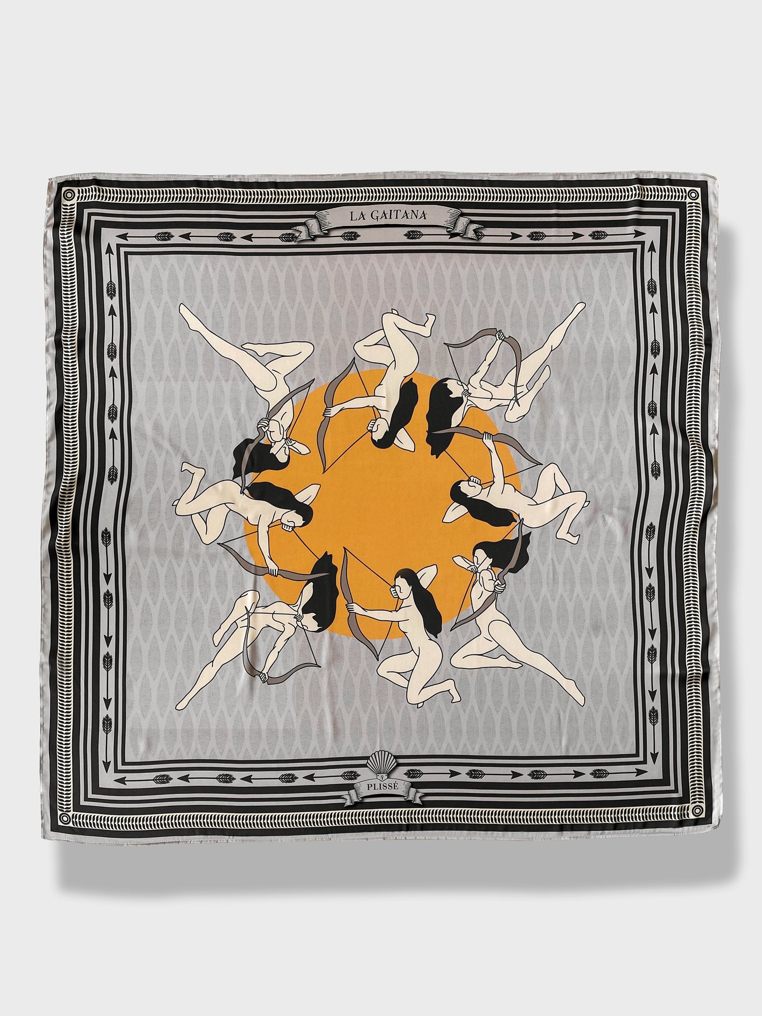 La Gaitana Scarf by Plissé. Image of 8 Cacica Gaitana in a circle over a yellow dot. The whole deign over over a light grey geometric pattern with a frame like border and arrow border. The overall tone of the scarf is a washed out grey.