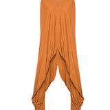 Image of a jumpsuit against a white background. The purpose of this image is to highlight the jumpsuit from NAOS, which is for sale at EVAMAIA boutique in Studio City, CA.