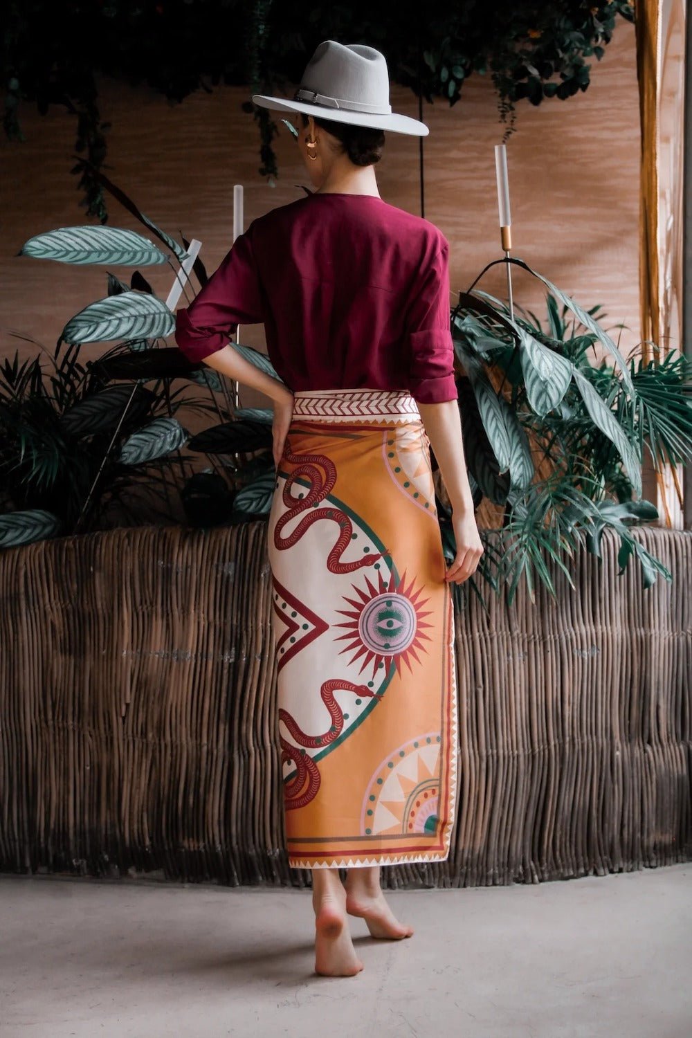 Back of Women modeling cream nazar wrap skirt