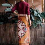 Back of Women modeling cream nazar wrap skirt