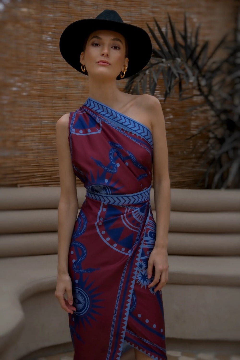 Women modeling the burgundy nazar wrap dress