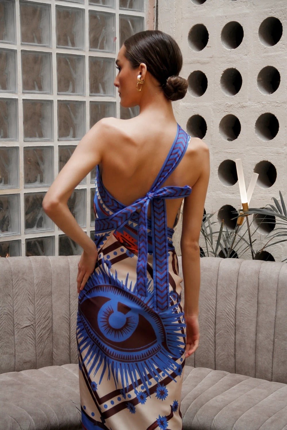 Back of Women modeling lavender nazar wrap dress