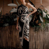 Women modeling black nazar wrap dress