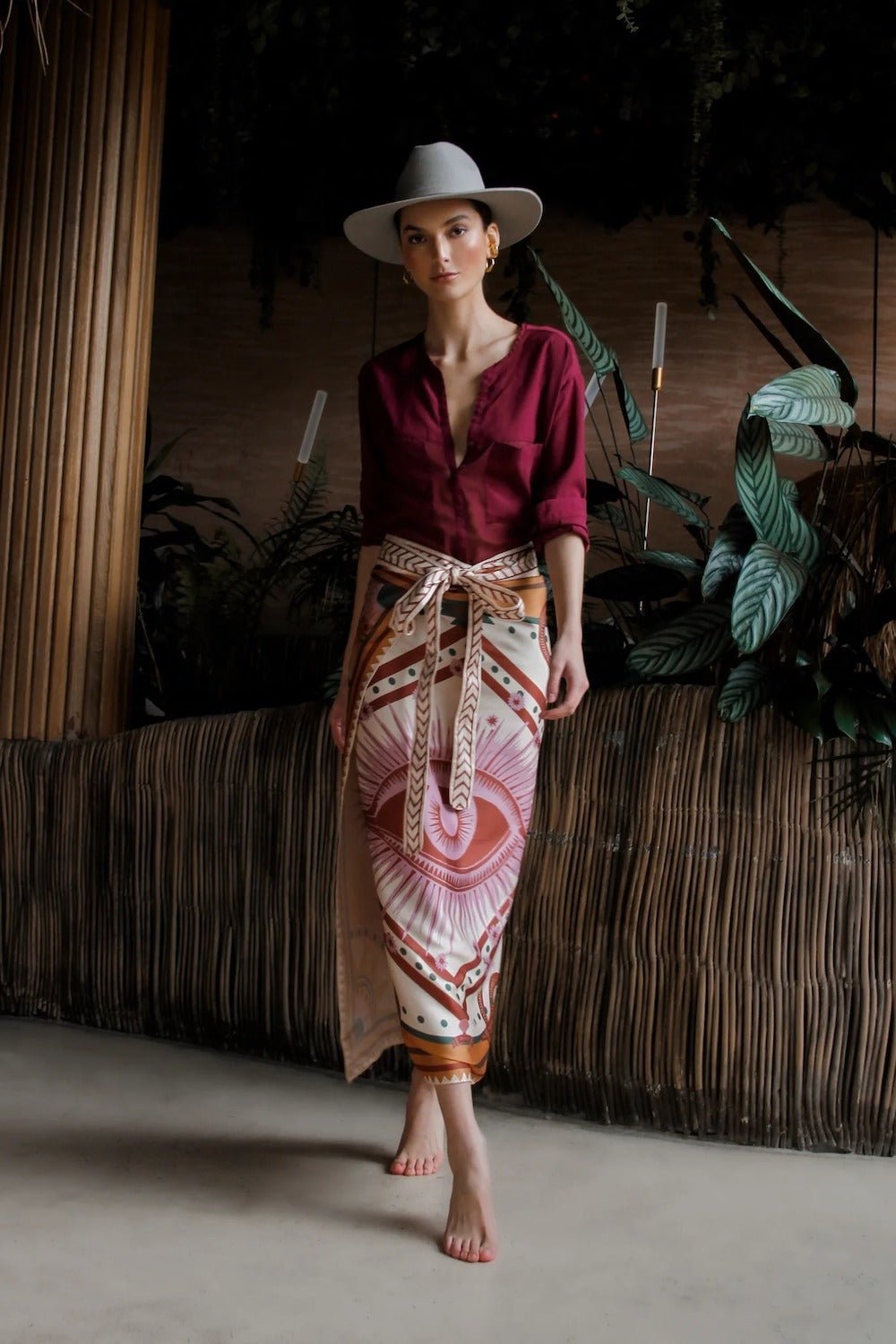 Women modeling cream nazar wrap skirt