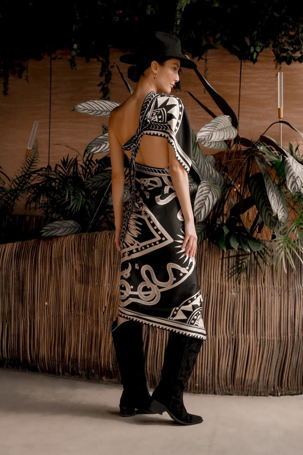 Women modeling black nazar wrap dress