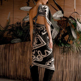 Women modeling black nazar wrap dress