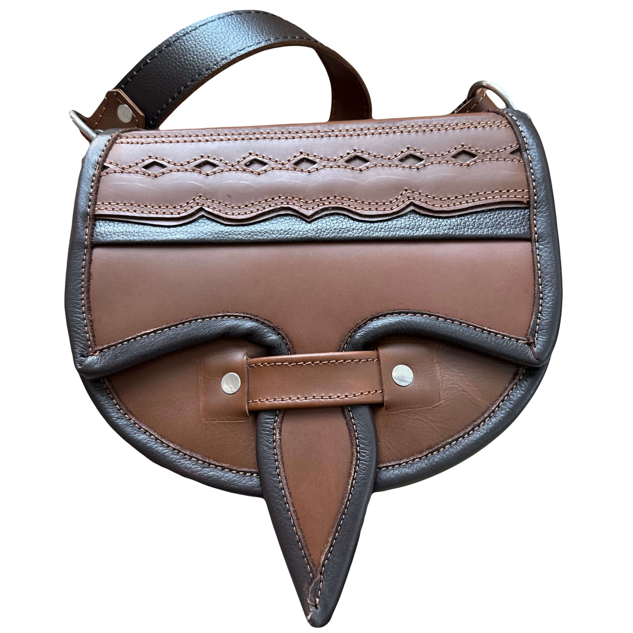 A traditional Colombian carriel belt bag with a patterned leather finish, featuring multiple compartments.