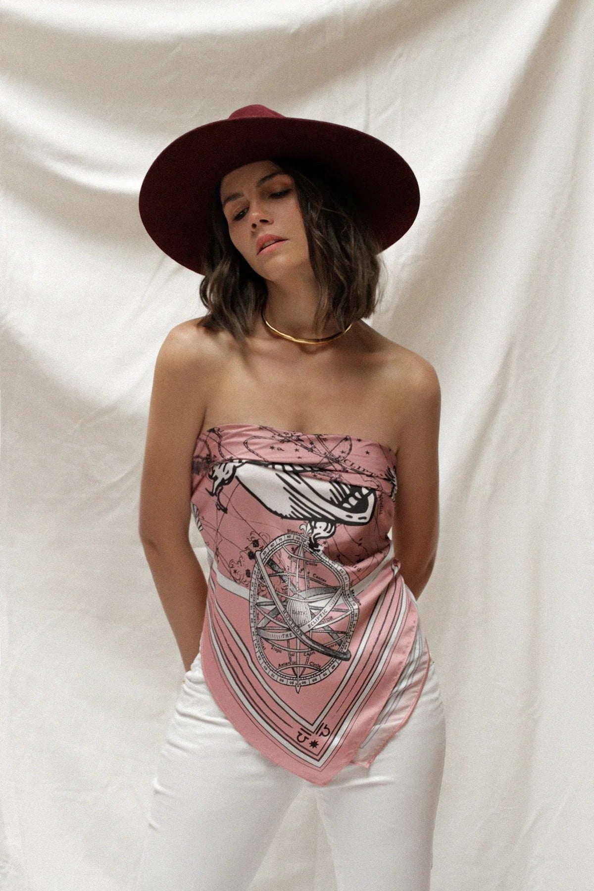 Model wearing the Zodiac Scarf for Libra as a Classic Bandana Top.