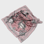 Zodiac Scarf for Libra - EVAMAIAZodiac Scarf for Libra made by Plissé. Image of scales. It is on top of a astrological background. Details like a white ecliptic, sun, and moon. The scarf is pink with white details scrunched on plain background.