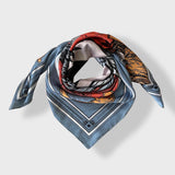 Zodiac Scarf for Virgo made by Plissé, wrapped as if on neck on a plain white background.