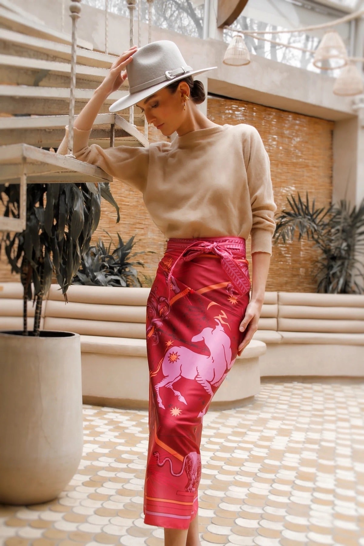Woman modeling Fire Zodiac Wrap Dress wearing crewneck