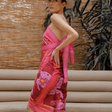 Side of Woman modeling Fire Zodiac Wrap Dress standing on stairs