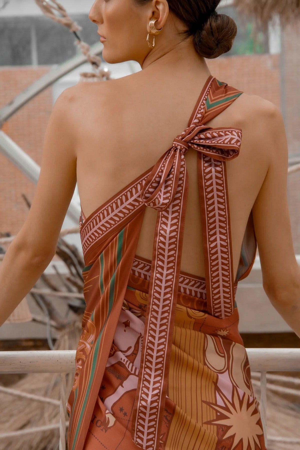 Close up of back of Earth Zodiac Wrap Dress