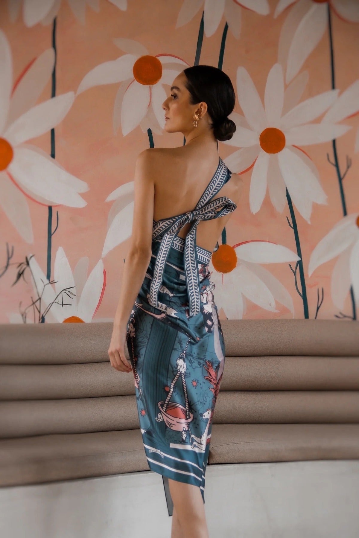 Woman modeling Air Zodiac Wrap Dress
