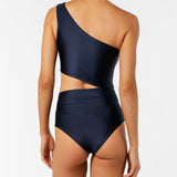 This navy one-piece swimsuit features an elegant one-shoulder silhouette and a triangular side cutout for a modern, sculptural look.