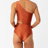 Diana orange one-shoulder one-piece swimsuit by Encantadore with ruching and side cutout, back view. Available at EVAMAIA in Studio City, Los Angeles.