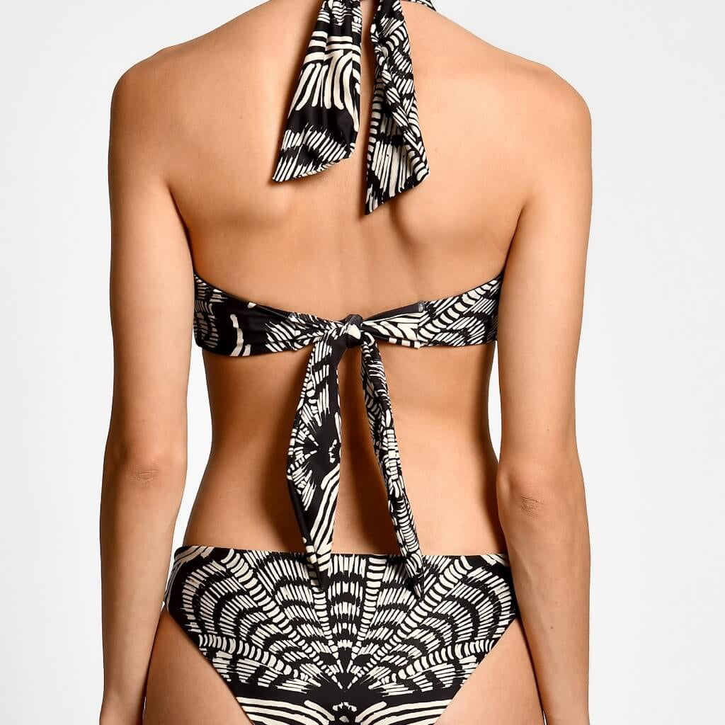 Black and white patterned bikini on a plain background.