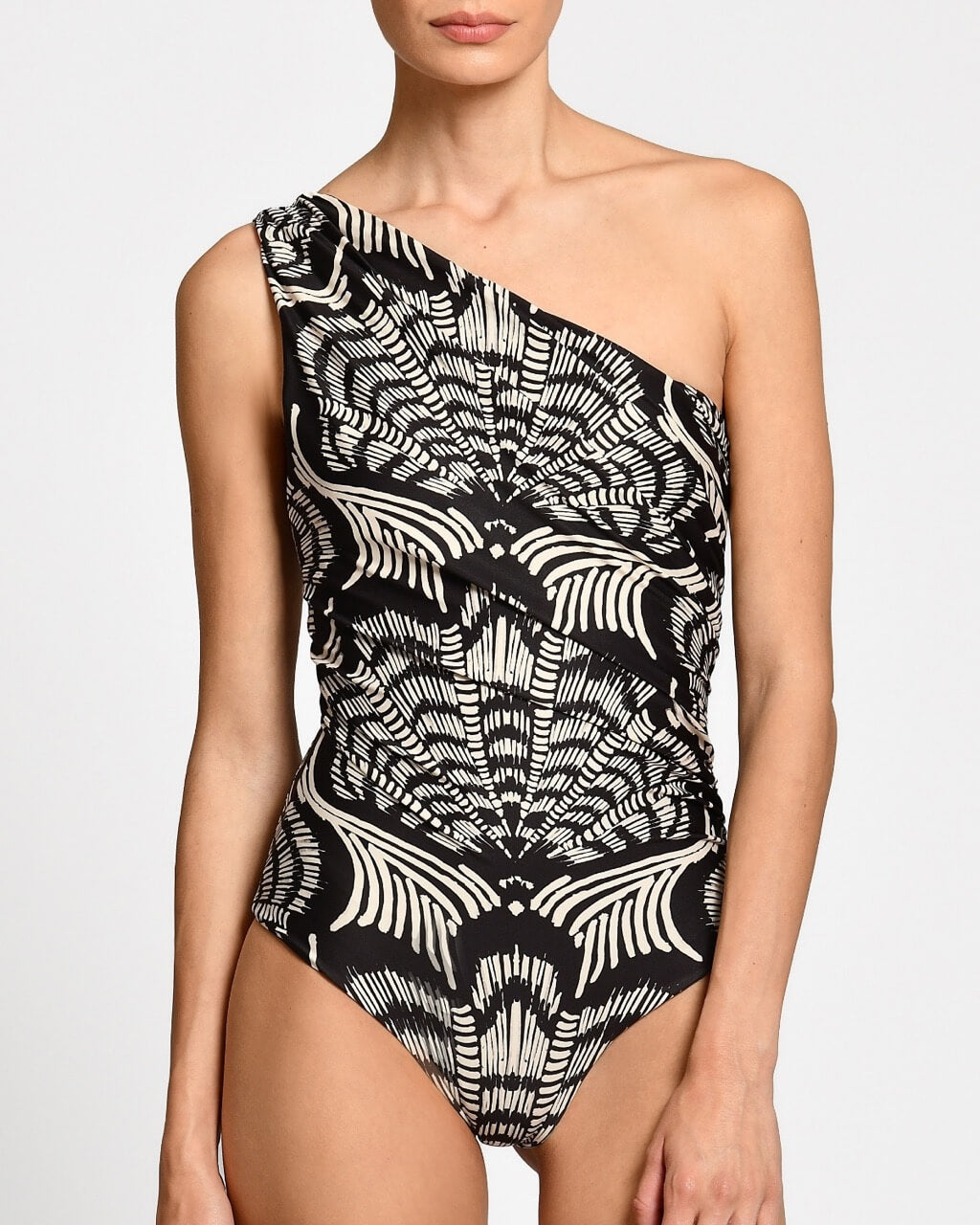 Black and white patterned one-shoulder swimsuit on a plain background.