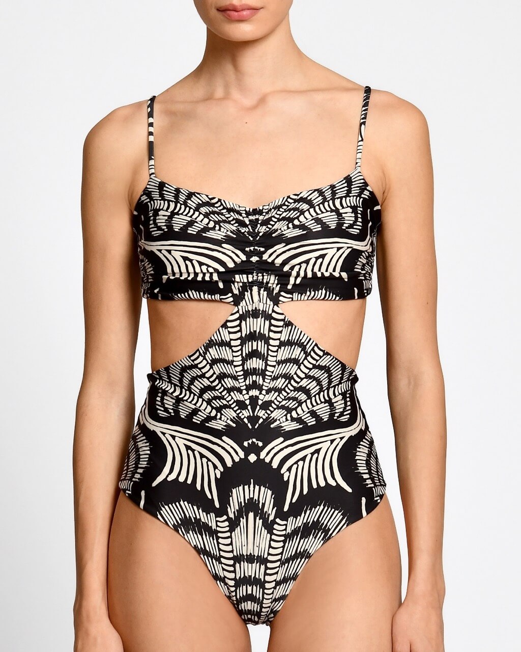 Black and white patterned swimsuit on a plain background.