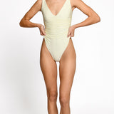 Ruched ivory one piece swimsuit with V neck.