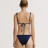 Navy blue bikini set on a plain background.