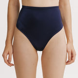 Navy high-waisted bikini bottom on a white background.
