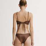 Brown bikini with a bow detail on a white background.
